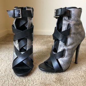 Size 6 silver and black heels. ( True to Size )